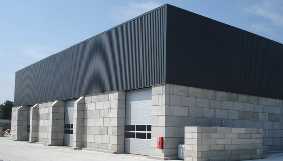 Industrial buildings - interlocking concrete blocks with steel roof